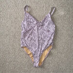 Purple floral one piece swimsuit with low back